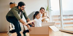 happy daughter having fun with parents